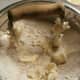Cut butter into the mixture with a pastry cutter or two knives.