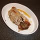 Roast duck carcass with serving portions removed