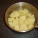 Potatoes are chopped for boiling