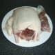 Giblets are removed from duck cavity and excess skin and fat is cut away