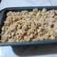 Pour streusel over batter