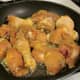 Brown chicken in oil on high heat in frying pan.