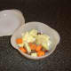 Pigeon breasts and veg are added to the casserole dish
