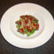 Pigeon breast salad with bacon, watercress, toasted pine nuts and peri peri sauce