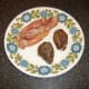 Fried bacon and pigeon breasts
