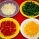 Add 1 cup onion, 1 cup each yellow and red bell peppers, and 2 cups green bell peppers.