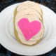 Heart-shaped cutouts from sugar sheets.