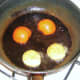 Frying tomato and mushrooms