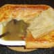 Pie is cut open for serving