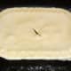 Rabbit pie is glazed and ready for the oven