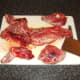 The legs should firstly be removed when chopping a rabbit in to portions
