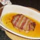 Roast rabbit saddle removed from the oven