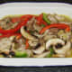 Rabbit and pork pie filling is added to pie dish