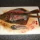 Second fillet is removed from the flounder