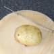 Metal skewer easily pulls free from baked potato