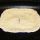 Glazed and vented pie is ready for the oven 