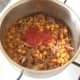 Tomato ketchup is an optional ingredient in the mince and baked beans