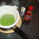 Peas are drained and seasoned