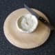 Lid is carefully placed on Scotch pie and a steam vent is cut