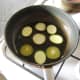 Frying courgette and aubergine slices