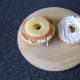 Pineapple ring is laid on top of the smoked salmon