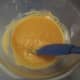 Step 2: Stir peanut butter and oil together in a bowl. Add the brown and white sugars and blend until well combined.