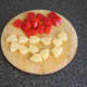 Chopped red bell pepper and pineapple pieces