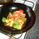 Tomato is added to the Kung Po chicken at the very end of the cooking process