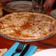 Half-Lobster Half-Fish Pizza. Customers often like tartar sauce or one of its variations on this dish.