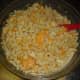 Once the macaroni has finished cooking, drain thoroughly and mix into the cheese mixture.