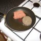 Pan frying haggis and Lorne sausage