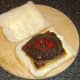 Ketchup is optional on a haggis, Lorne sausage and tattie scone sandwiuch.