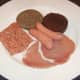 Meat components of an all day Scottish breakfast