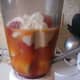 Orange juice, bananas, strawberries and yogurt in the blender.