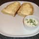 Bread and butter with garlic and chive dip