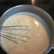 Step 1: Prepare the cooked custard by mixing the evaporated milk, half & half, and the eggs in a sauce pan. Use a whisk to stir constantly until hot and slightly thickened. Step 2: Cover and cool in the refrigerator about an hour.
