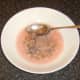 Impurities skimmed from simmering rowan jelly concentrate