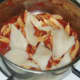 Chunks of plaice fillet are added to pasta and tomato sauce