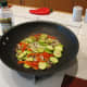 Saute the topping mixture in olive oil