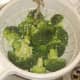 Broccoli florets are washed before being cooked