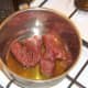 Browning venison in olive oil