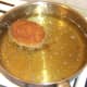 Frying breadcrumbed haggis duck egg