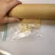 4. Optional: Add cracker crumbs to make  cookies hold up better. Crush crackers in Zip lock bag with rolling pin.