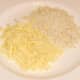Grated cheddar cheese and breadcrumbs