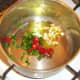 Frying off spices for bean chilli