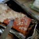 After cooking for 45-50 minutes, chisel away the layer of salt with a knife. (Excuse the blurry photo, the photographer was trembling with excitement at the sight of the rind!)