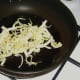 Frying seasoned cabbage strips