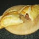 Spicy corned beef and cabbage pasty is halved to serve