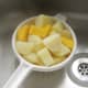 Boiled tatties and neeps are drained