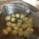 Allow the sprouts to steam for 5 minutes.  They will still be crunchy but slightly cooked through.